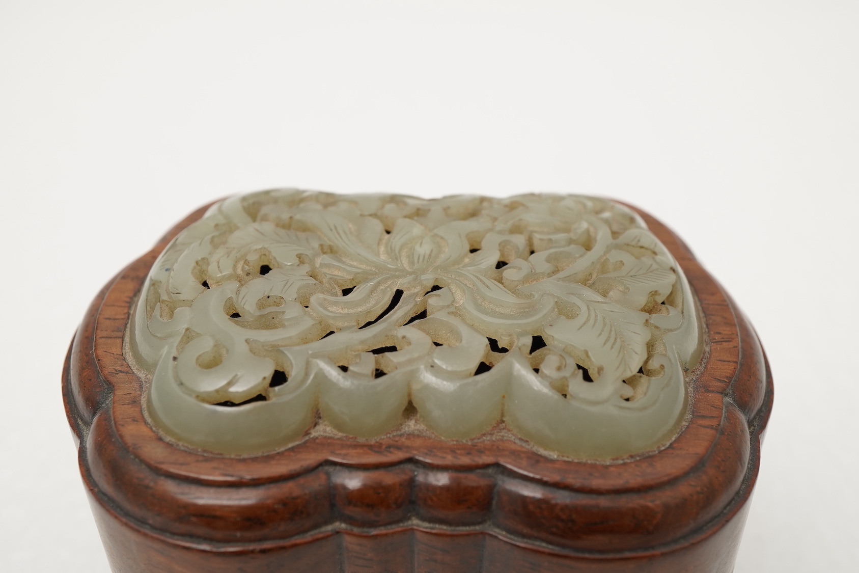 A Chinese jade mounted huanghuali box and cover, 19th century